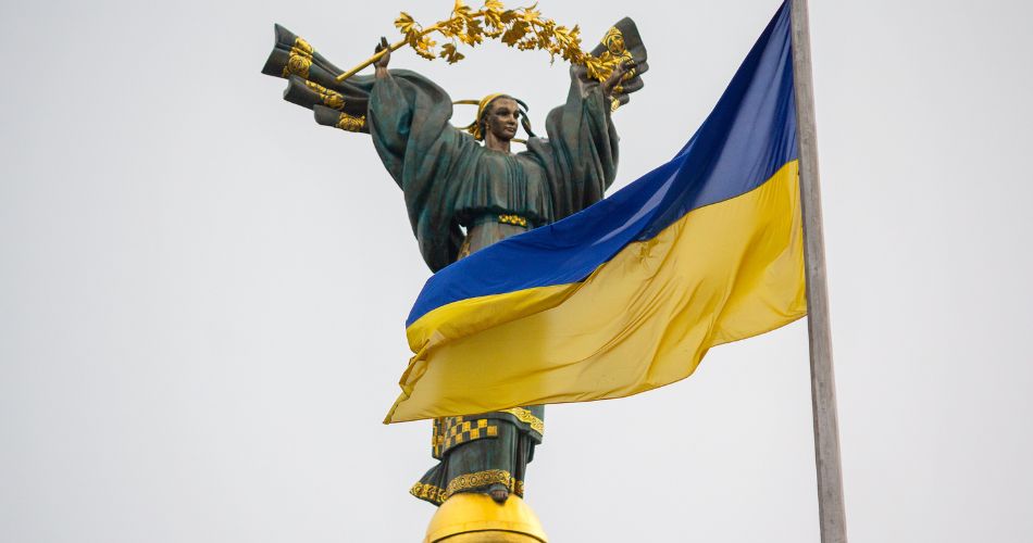 Independence monument and ukrainian flag in Kiev. Ukraine